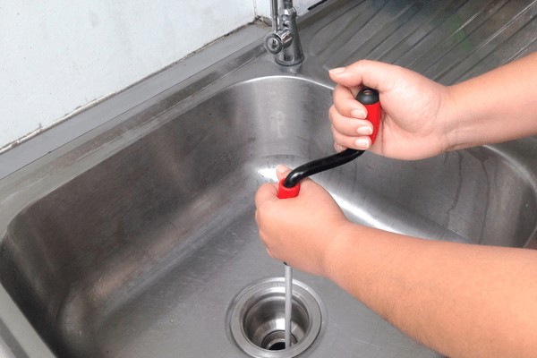 How Do I Snake a Sink Drain?